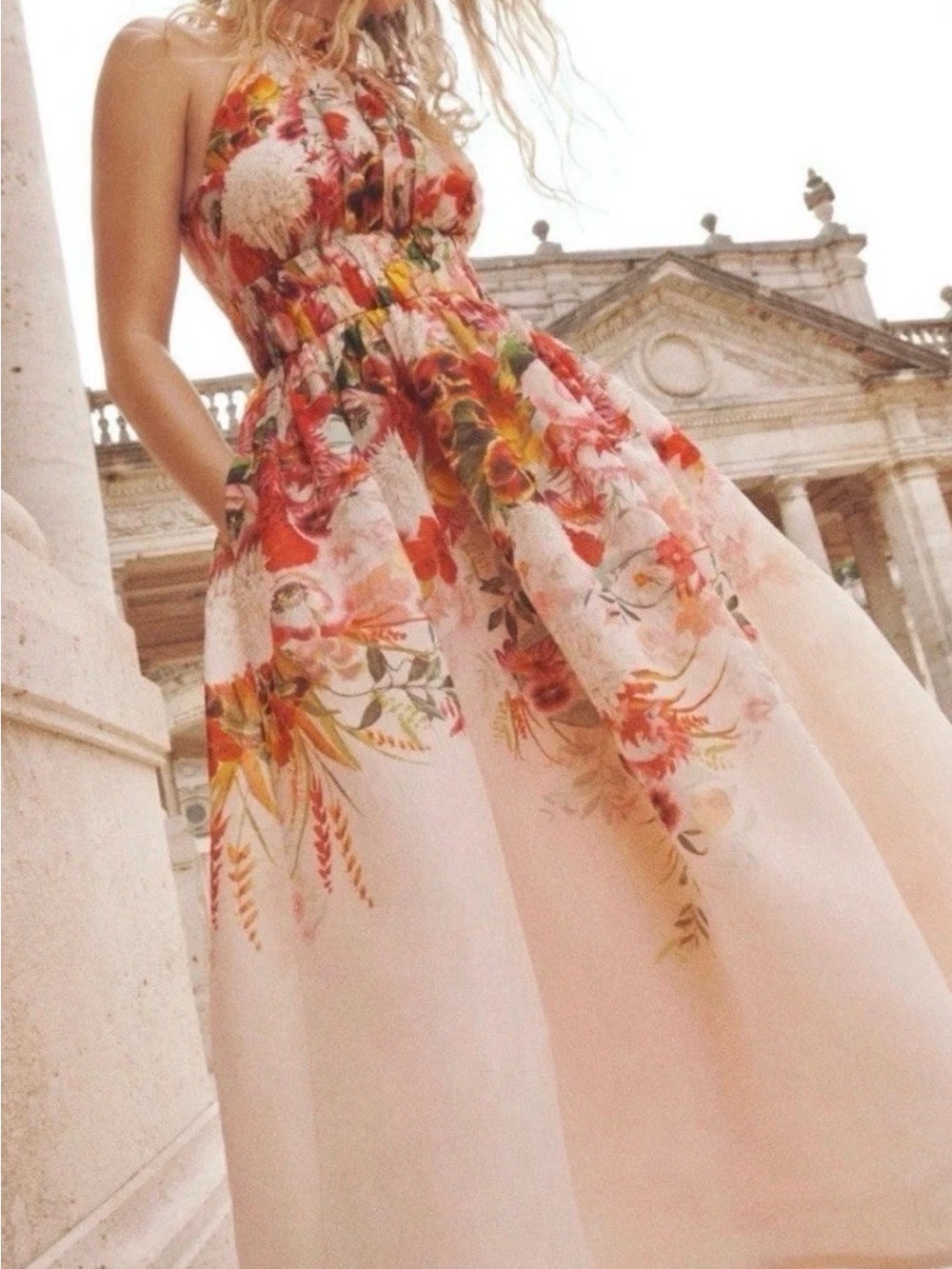 Zimmermann Wonderland Halter Dress, with
a vibrant floral print EUC